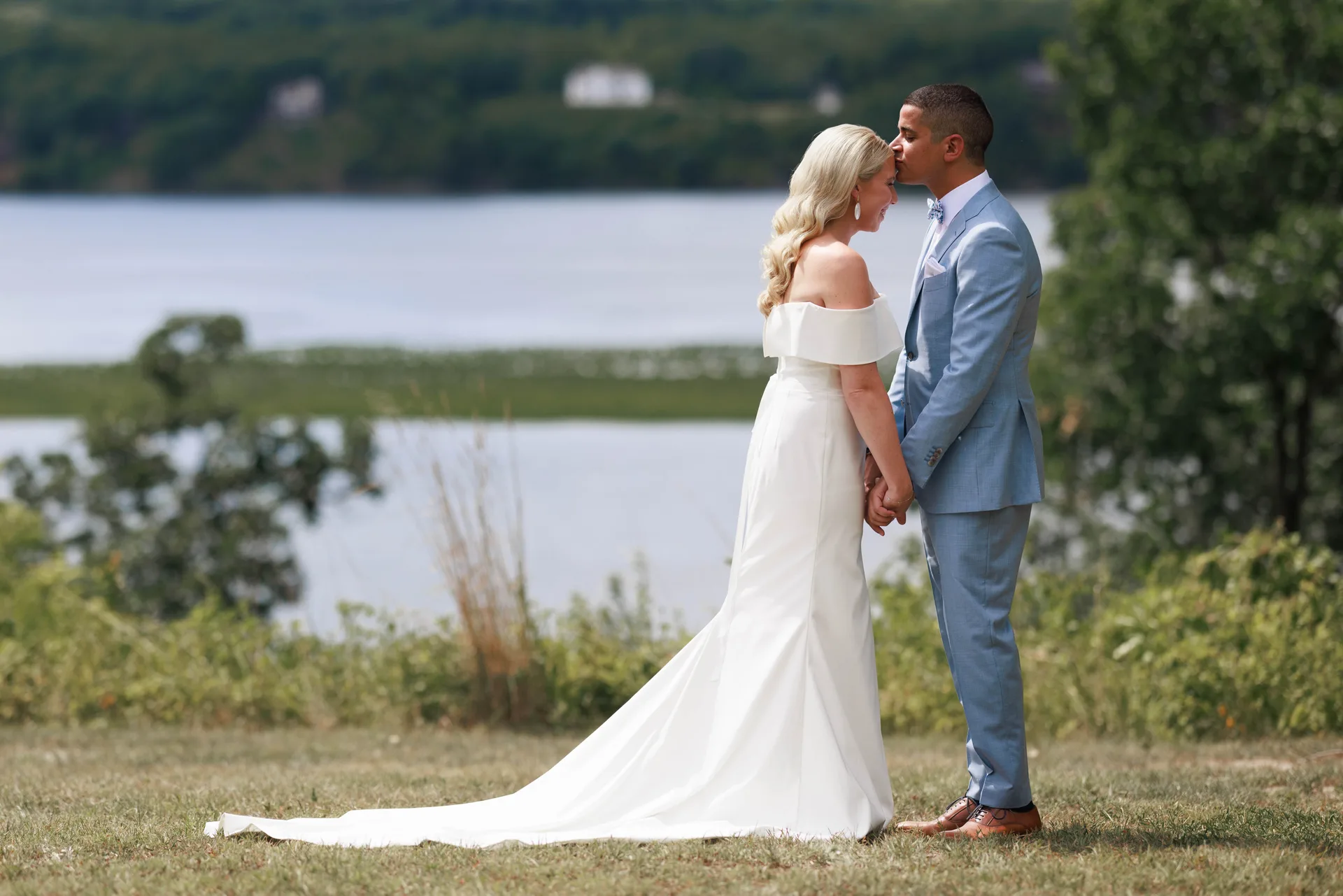 Bride and groom by the water — wedding photography by Sean Kenneth Doherty